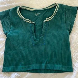 Flattering sought after Go for Gold Out from Under top from Urban Outfitters!